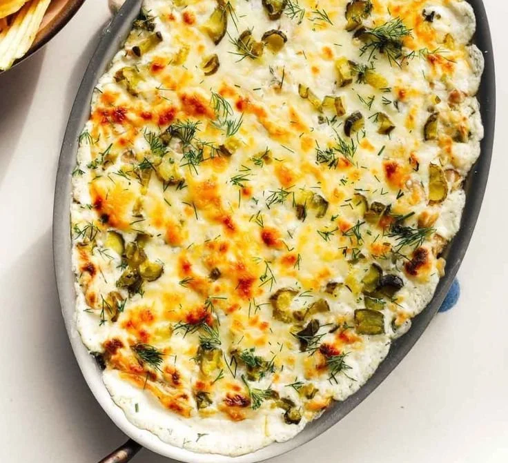 Delicious Baked Ranch Pickle Dip served in a bowl with crackers