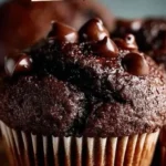 Bakery-Style Chocolate Muffins 3 Delicious bakery-style chocolate muffins fresh out of the oven