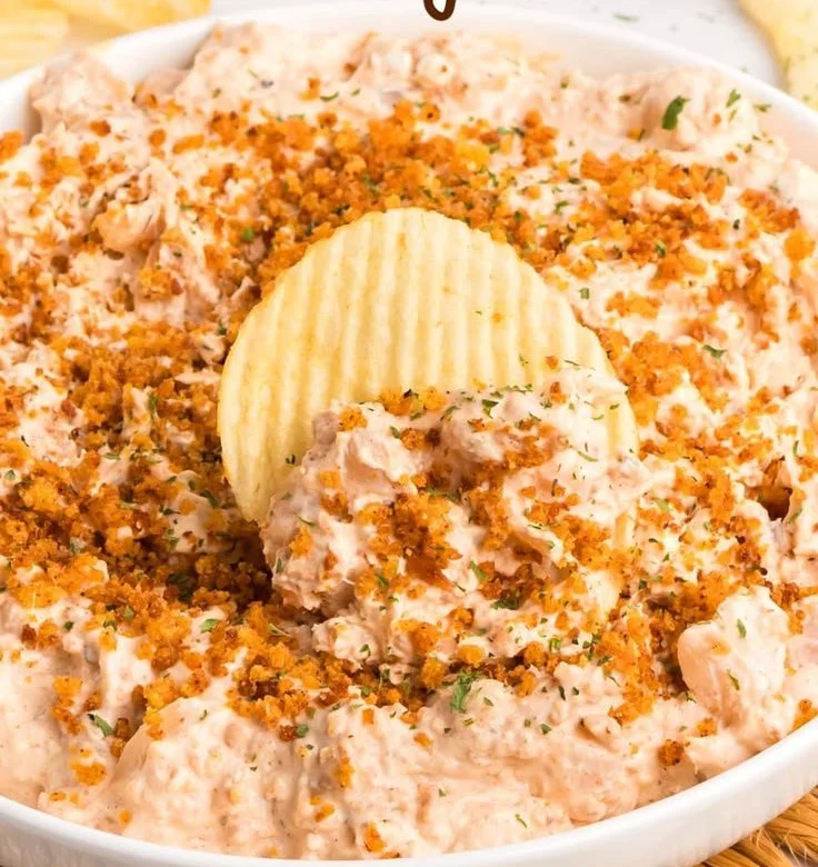 Delicious Bloomin’ Onion Dip served in a bowl with crispy chips
