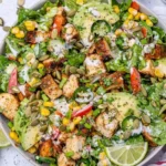 Delicious Chicken Chopped Salad with fresh vegetables and grilled chicken