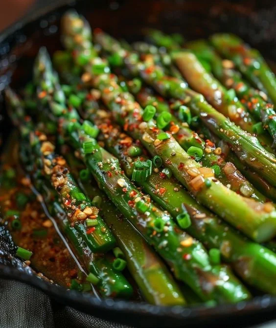 Sautéed skillet asparagus cooked to perfection in a frying pan.