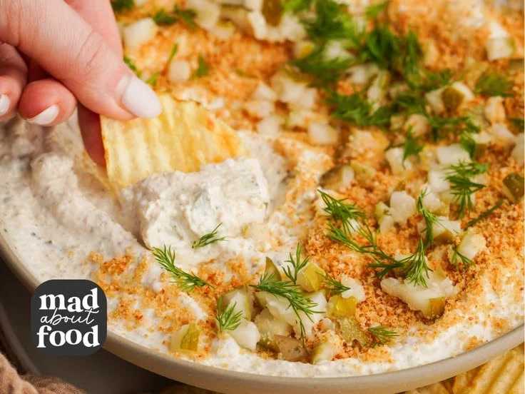 Delicious fried pickle dip served with crunchy tortilla chips