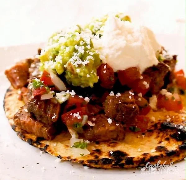Juicy grilled beef street tacos served with fresh toppings