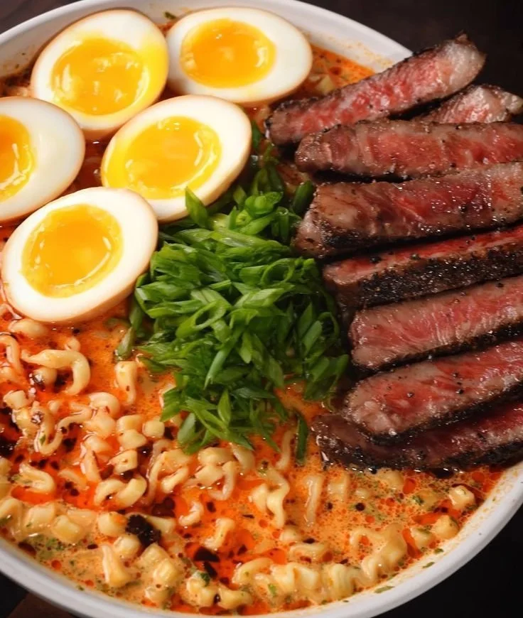 Spicy Steak Ramen Bowl with tender steak, noodles, and vibrant vegetables.