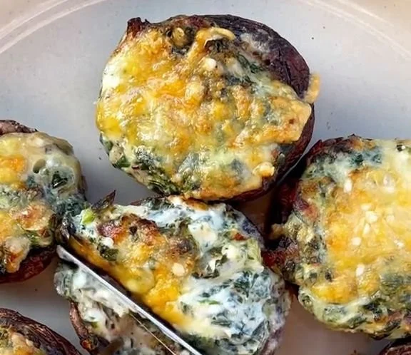 Delicious stuffed Baby Bella mushrooms ready to serve as an appetizer.