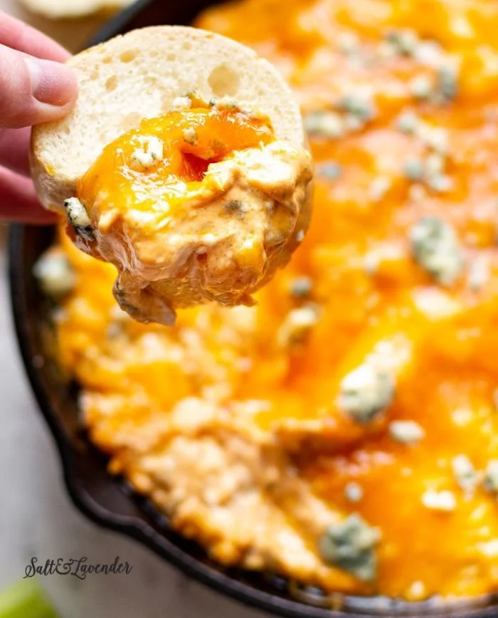 Delicious Ultimate Hot Dip served in a bowl with crunchy tortilla chips