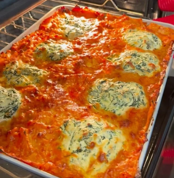 Delicious ultimate sheet pan lasagna with layers of cheese and sauce