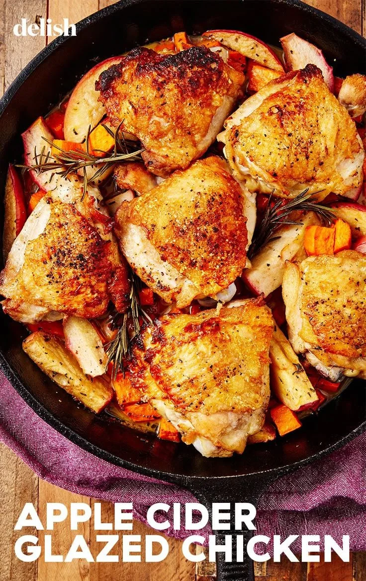 Delicious apple cider glazed chicken recipe with shiny glaze on a plate.