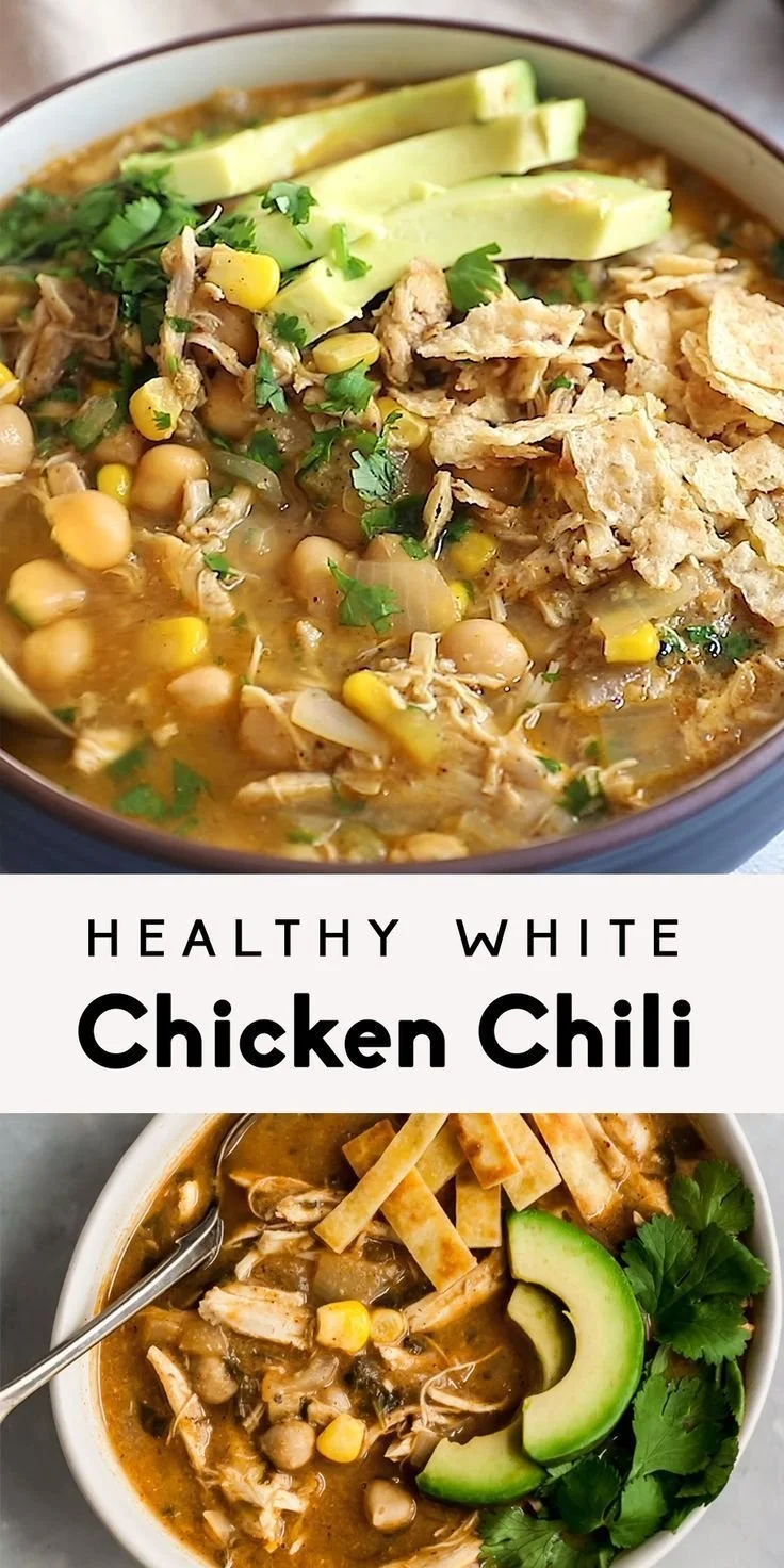 A bowl of healthy white chicken chili topped with fresh herbs and jalapenos.