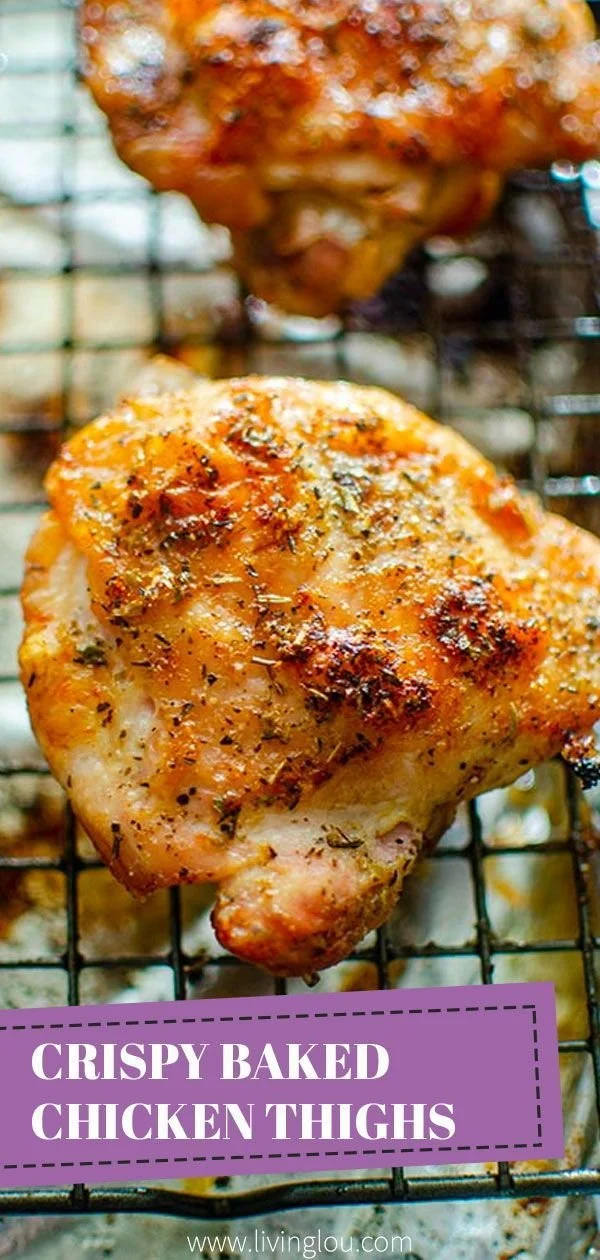 Perfectly roasted chicken thighs on a plate garnished with herbs