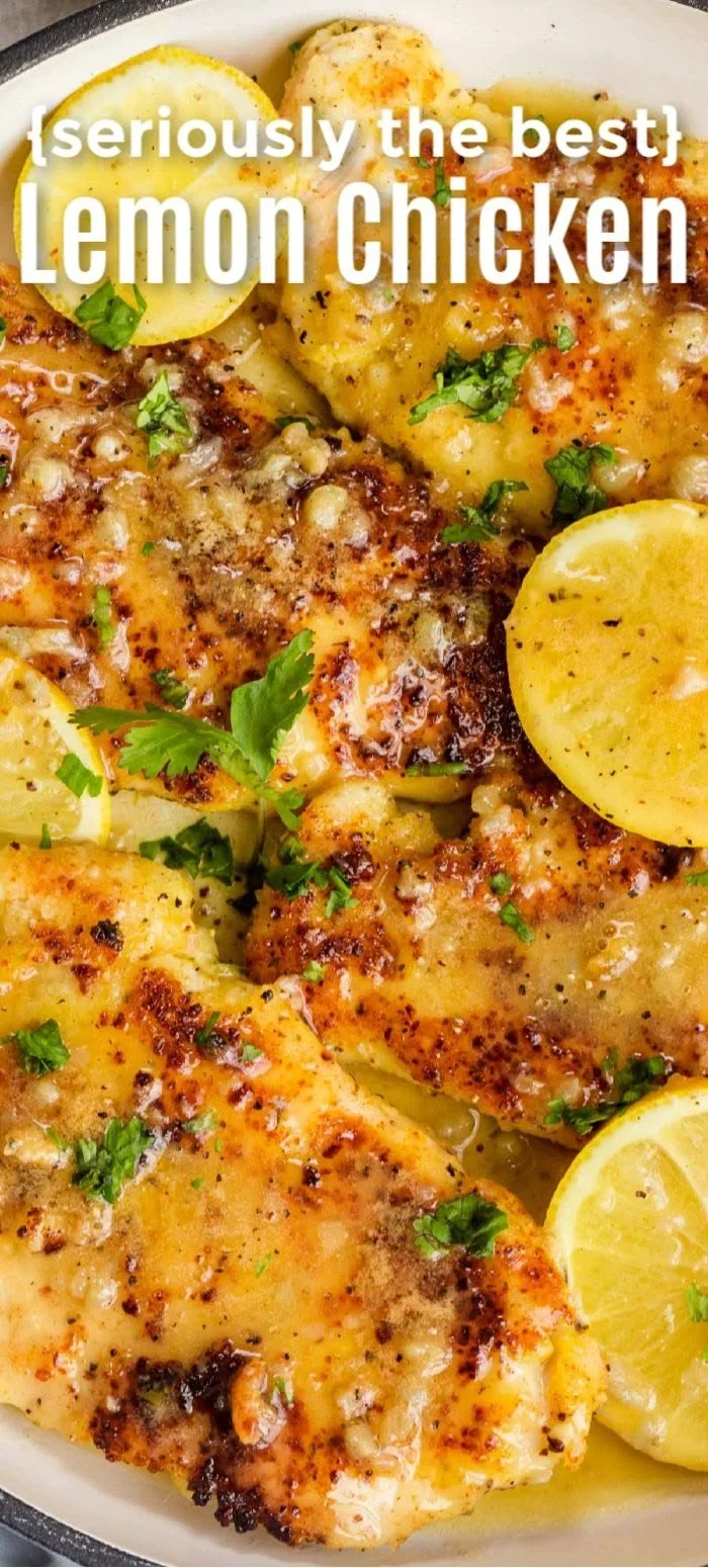 Delicious lemon chicken dish garnished with fresh herbs and lemon slices.
