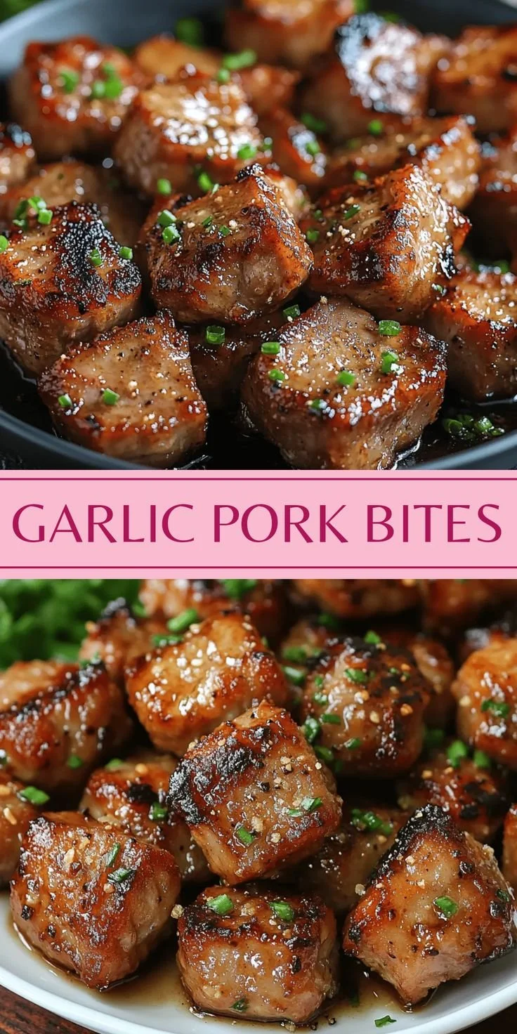 Savory garlic pork bites served on a platter, garnished with herbs.