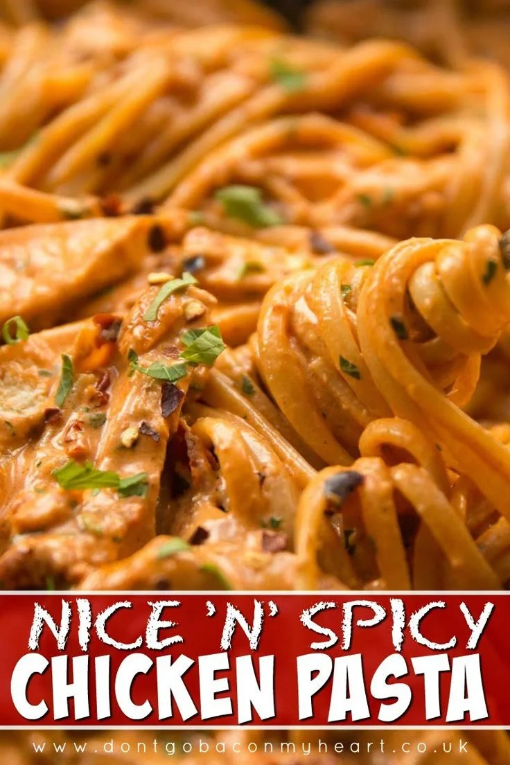 Delicious Spicy Chicken Pasta dish garnished with fresh herbs