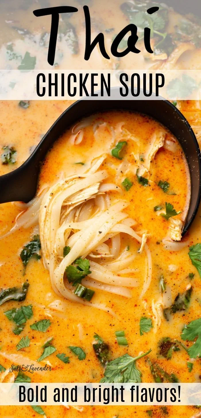 Bowl of Thai inspired chicken soup with fresh herbs and spices